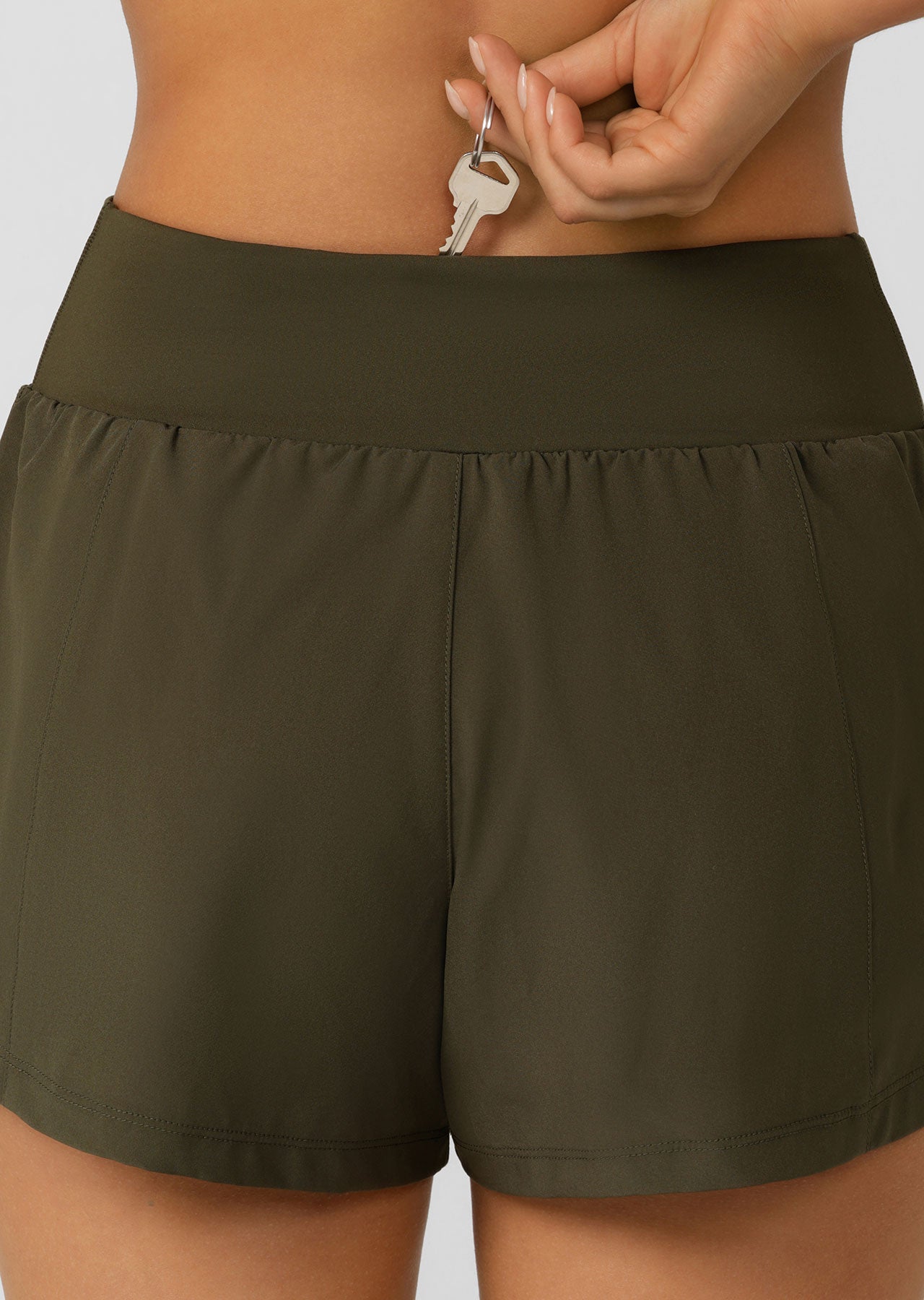 Lorna Jane Amy Stretch & Stride Pocket Run Shorts - Luxury Green